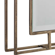 Set of two gold wall mirrors by Uttermost, featuring elegant round frames, perfect for modern or contemporary home decor.