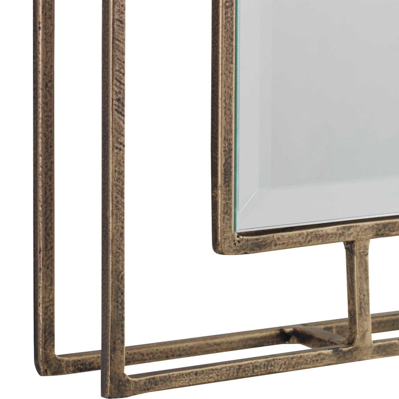 Set of two gold wall mirrors by Uttermost, featuring elegant round frames, perfect for modern or contemporary home decor.