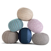 Simpli-Home Yolanda round accent pouf in natural fabric, soft textured seating or footrest with a modern design.