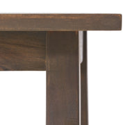 Noble House Kinesis outdoor side table with slatted top and wood frame, perfect for patio or garden spaces