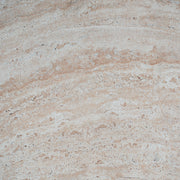 Beige Noble House indoor/outdoor concrete side table with travertine top, lightweight and elegant for patio or living room use.