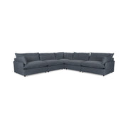 Classic Home Caplan modular sectional sofa with beige fabric and plush cushions in a modern living room setting.