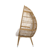 Noble House basket accent chair with teardrop shape and water-resistant cushion in natural wicker finish.