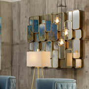 Uttermost Canute modern wall mirror with sleek rectangular frame, reflecting contemporary interior design style.