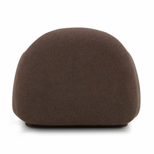 TOV Furniture Marius accent arm chair with plush fabric upholstery and sleek wooden legs in a modern living room setting.