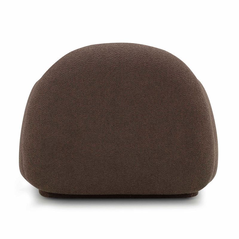 TOV Furniture Marius accent arm chair with plush fabric upholstery and sleek wooden legs in a modern living room setting.