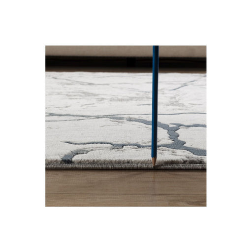 Geometrix - 7'10" X 10'6" Area Rug, Geometric 3D Effect - Ivory / Gray - R&R Furniture Gallery (Fountain Valley, CA)