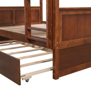 DreamHaus bunk bed with twin size trundle, featuring sturdy wooden frame and space-saving design for kids' bedroom.