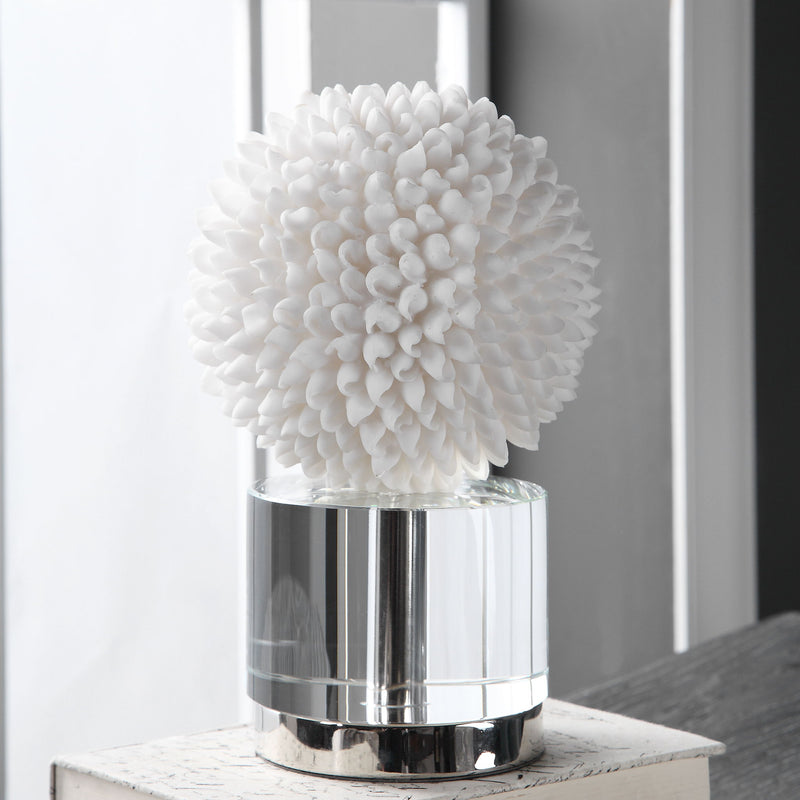 White Cascara sculpture by Uttermost, modern abstract sculpture with smooth curves and textured surface, displayed on a neutral background.