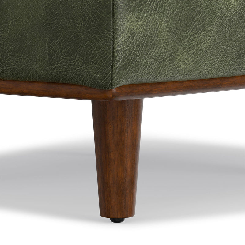 Simpli-Home Morrison handcrafted upholstered ottoman with plush fabric and wooden legs, versatile accent piece for living room decor.
