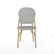 Set of two Noble House outdoor rattan and aluminum armless French bistro chairs in dark gray, suitable for patio or garden.