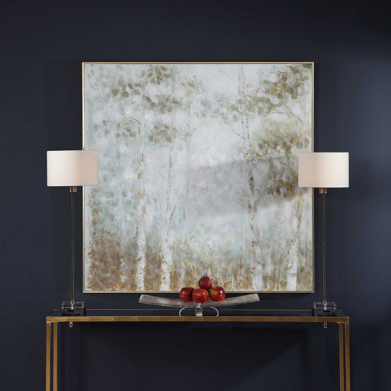 Light blue cotton woods hand-painted canvas art by Uttermost, featuring detailed brushstrokes and botanical design.