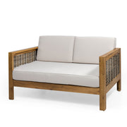 Outdoor 4-seater acacia wood chat set with wicker accents and beige cushions, ideal for patio relaxation.