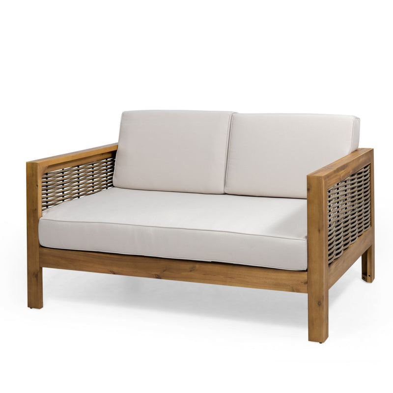 Outdoor 4-seater acacia wood chat set with wicker accents and beige cushions, ideal for patio relaxation.