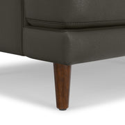 Livingston upholstered stationary sofa by Simpli-Home with plush fabric and cushioned back in a modern living room setting.