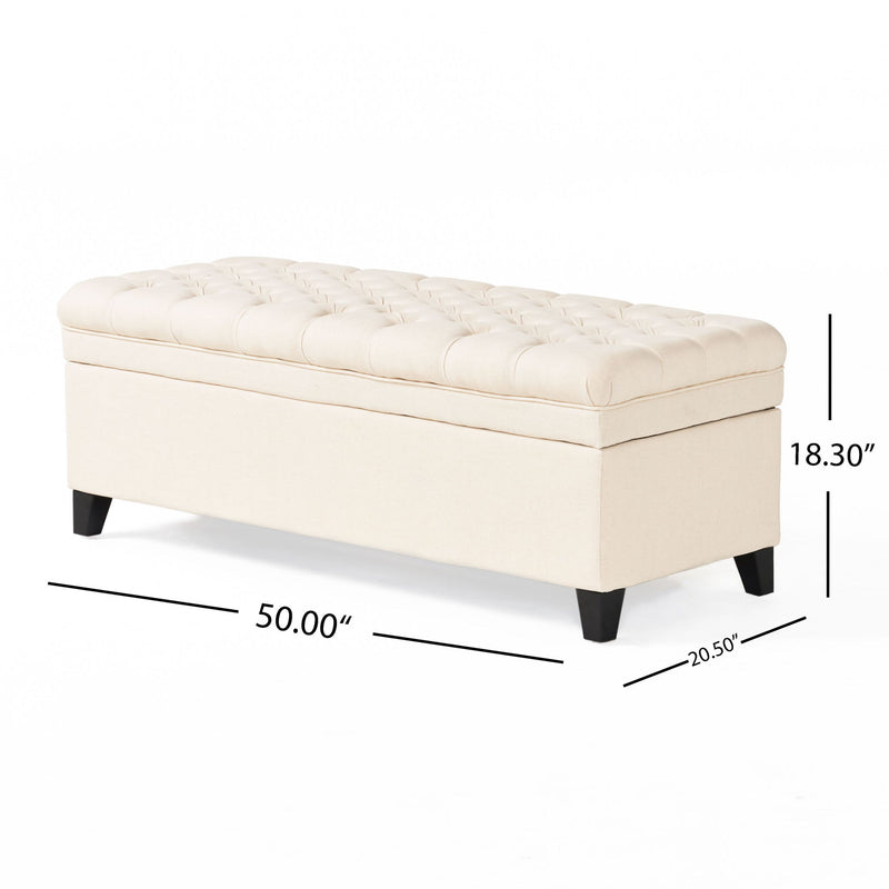 Juliana storage ottoman with birch wood legs, upholstered fabric top, and spacious interior for versatile living room storage.