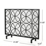 Noble House Thayer single panel iron fireplace screen with geometric design, featuring black metal and decorative cutouts.