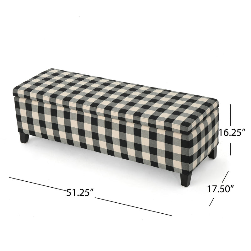 Black Noble House contemporary storage ottoman with cushioned top and hidden storage compartment.