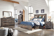 Signature Design by Ashley Drystan bookcase bed with storage, part of an 8-piece bedroom set, featuring a modern wood finish and built-in shelves.