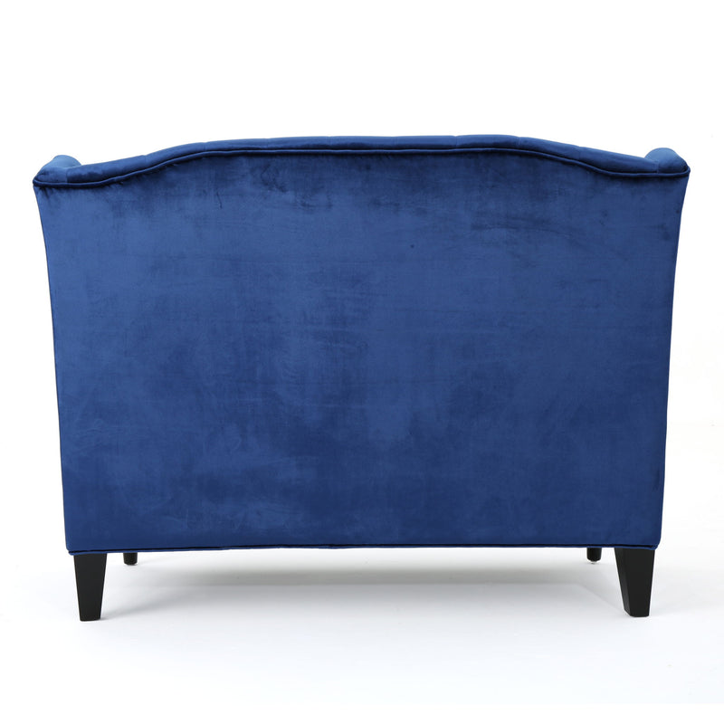 Noble House upholstered loveseat with wingback design, diamond tufting, and plush seating for a stylish, stationary living room accent.