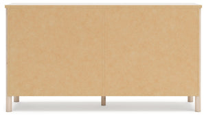 Signature Design by Ashley Cadmori six drawer dresser with sleek wood finish and modern hardware, showcasing ample storage space.