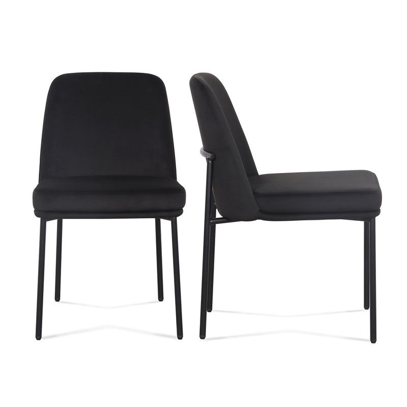Two Sydney dining chairs by TOV Furniture with sleek design and neutral upholstery, perfect for modern dining spaces.