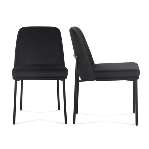 Two Sydney dining chairs by TOV Furniture with sleek design and neutral upholstery, perfect for modern dining spaces.