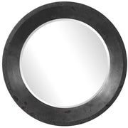 Uttermost Frazier round industrial wall mirror with a black metal frame, showcasing a modern industrial design.