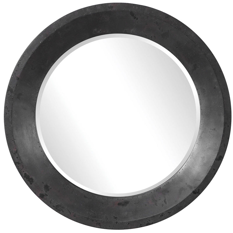 Uttermost Frazier round industrial wall mirror with a black metal frame, showcasing a modern industrial design.