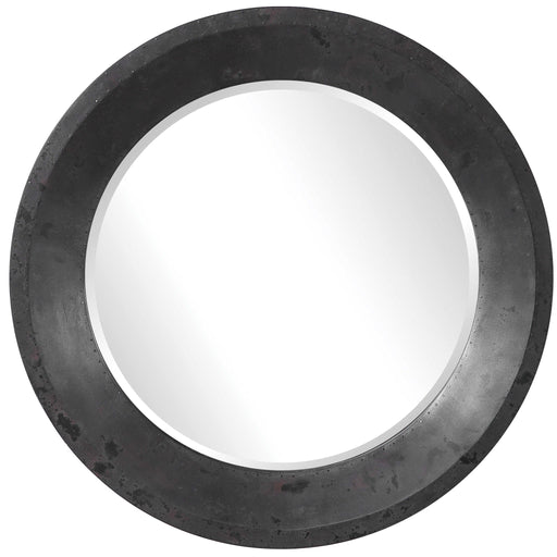 Uttermost Frazier round industrial wall mirror with a black metal frame, showcasing a modern industrial design.