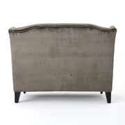 Nurturing - Upholstered Loveseat With Wing Back And Diamond Tufting - R&R Furniture Gallery (Fountain Valley, CA)