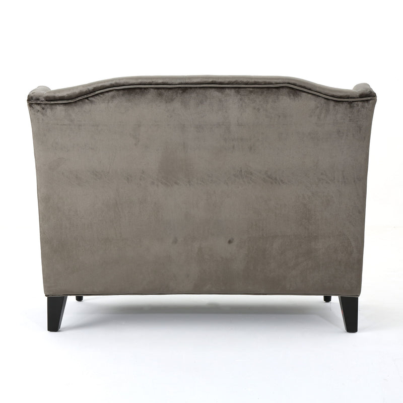 Nurturing - Upholstered Loveseat With Wing Back And Diamond Tufting - R&R Furniture Gallery (Fountain Valley, CA)