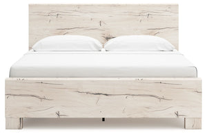 Signature Design by Ashley Lawroy panel bed with built-in storage drawers in a modern bedroom setting.