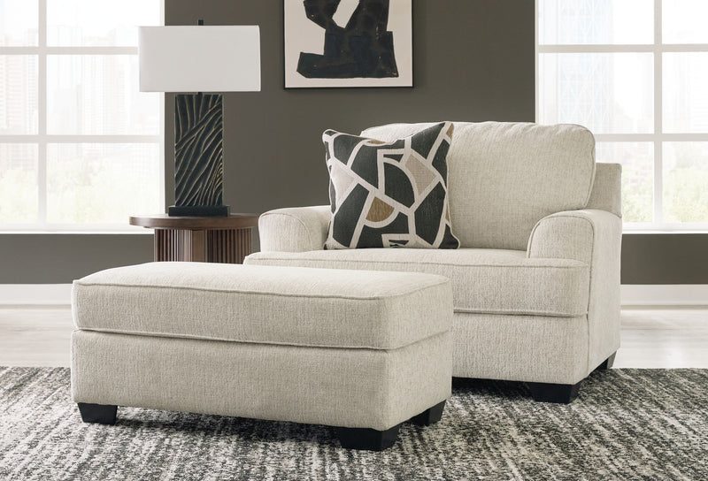 Benchcraft® Heartcort living room set with stationary chair and matching ottoman in a cozy, modern design.