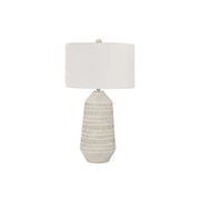 Cream ceramic table lamp by 8th Street, contemporary lighting with a sleek design, perfect for modern home decor.