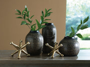 Signature Design by Ashley Vinburn accessory set with five stylish table accessories arranged on a wooden surface.