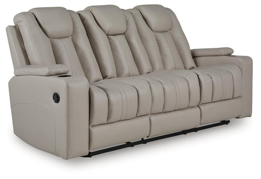 Signature Design by Ashley Elevate Edges reclining sofa with drop-down table in coin fabric, showcasing plush cushions and armrest.