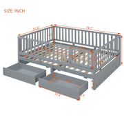 DreamHaus storage daybed with fence guardrails, two drawers, and split into a floor bed and daybed, shown in a cozy bedroom setting.