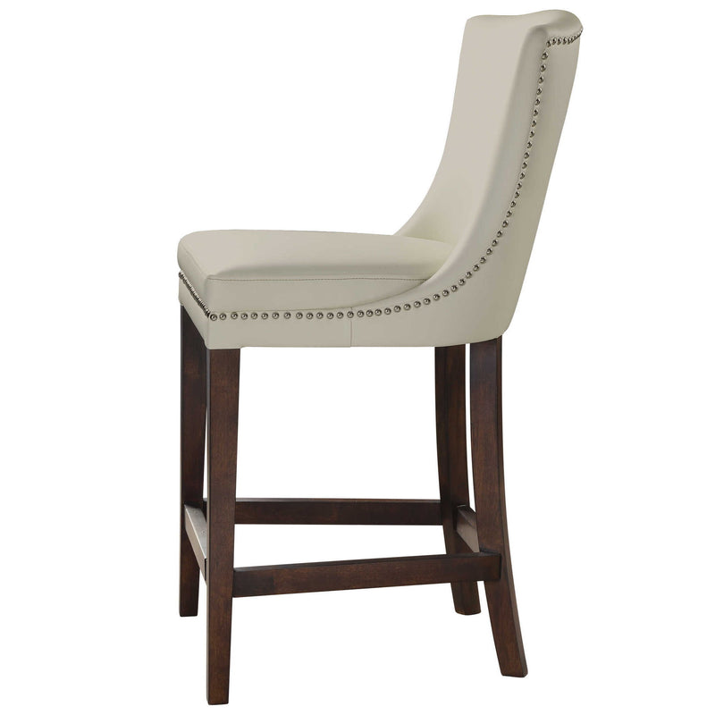 White Dariela counter stool by Uttermost with a sleek design and wooden legs, suitable for kitchen or bar area.