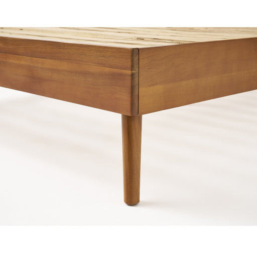 Noble House Okioki mid-century natural stained solid acacia wood platform bed shown in a modern bedroom setting.