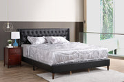 Contemporary upholstered bed by Glory Furniture in a spacious bedroom, featuring plush fabric and modern design.