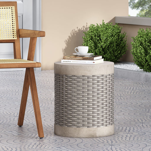 Round outdoor concrete end table by Noble House, lightweight natural finish, ideal for patio or garden seating areas.