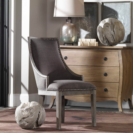 Uttermost Ermanno teak ball sculptures set of 2 in pearl silver with textured surface, decorative figurines for modern interior decor.