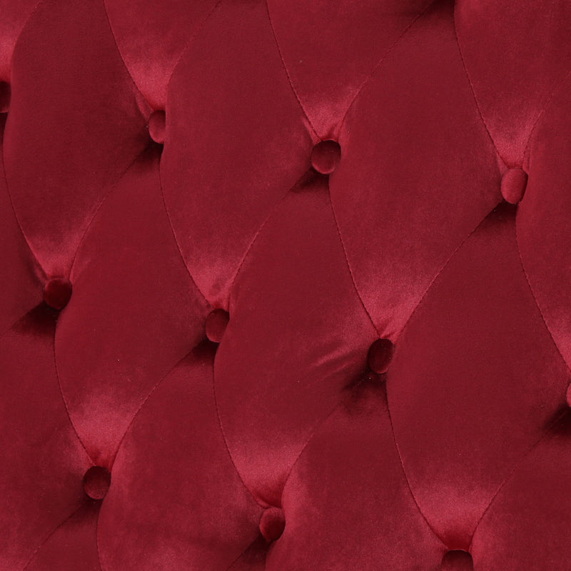 Noble House upholstered loveseat with wingback design and diamond tufting, featuring plush fabric and elegant style.