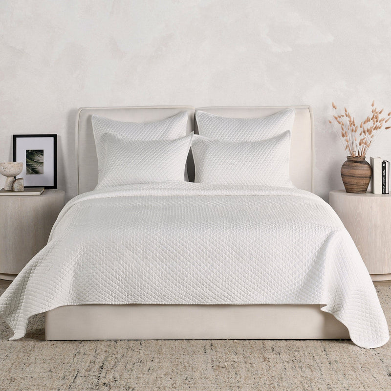 Classic Home Diamond quilt set with matching shams, featuring a geometric diamond pattern in soft, neutral colors.