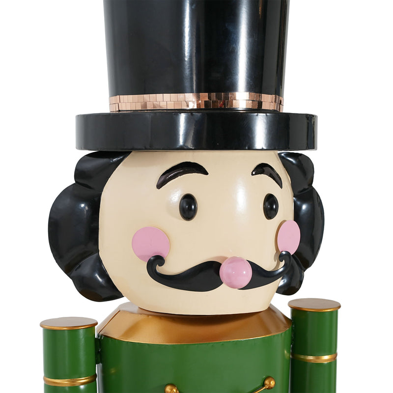 Noble House Christmas nutcracker holiday decor in green and red, standing with a festive, detailed design ideal for seasonal decoration.