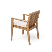 Noble House 5-piece patio furniture set with acacia wood table and four cushioned outdoor chairs for patio or garden use.
