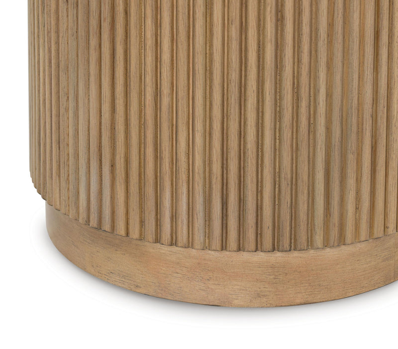 Round light brown and white end table by Signature Design by Ashley, featuring a smooth surface and modern design.
