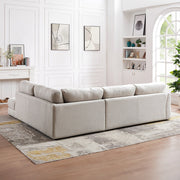Ashcroft Furniture Glander cozy sectional sofa with plush cushions and modern design, ideal for a comfortable living room setting.