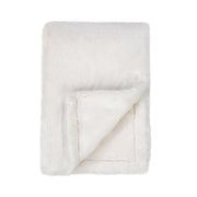 Classic Home Taiga throw blanket with textured fabric in neutral tones, cozy and stylish for sofa or bed.